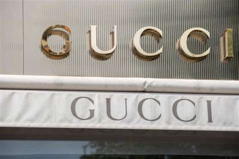 who owns gucci brand now|who is gucci owned by.